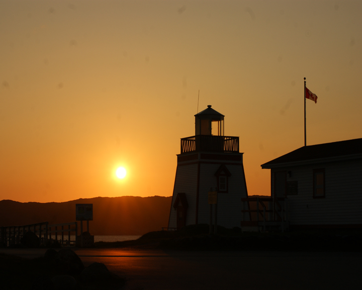 lighthouse at sunset photograph